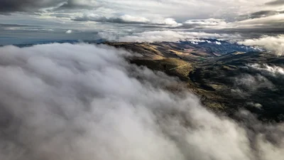 Low cloud rolling over the ridges of the Sumapaz páramo in Colombia, seen from above